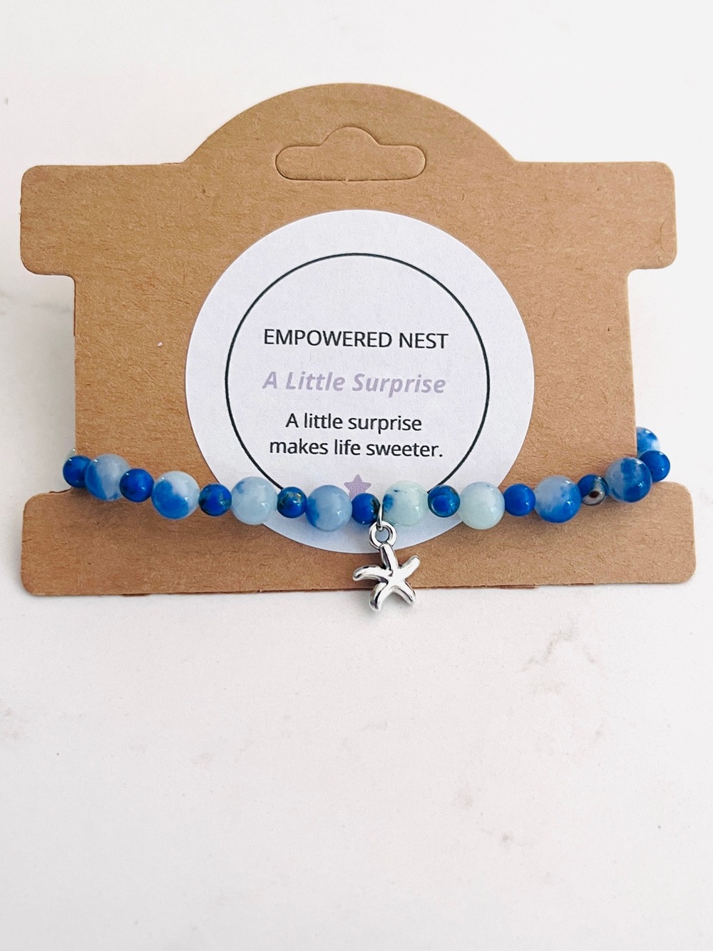A Little Surprise Bracelet | Blue Beaded Starfish Charm Bracelet | Joy & Coastal
